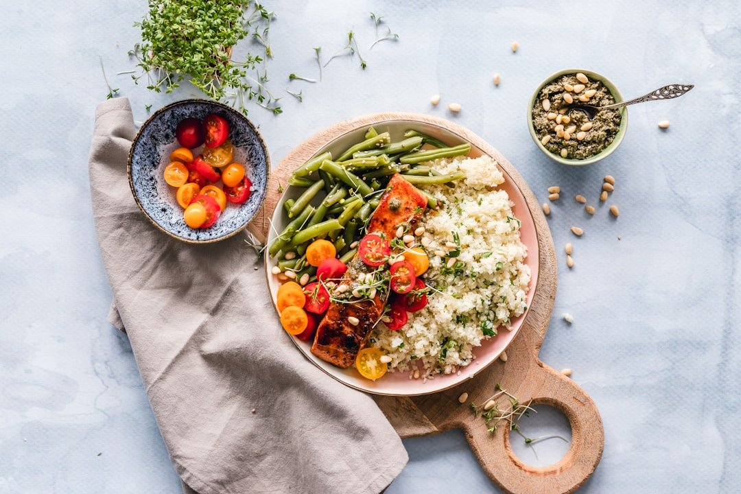 An image depicting a balanced plate incorporating Quinoa alongside other wholesome foods.
